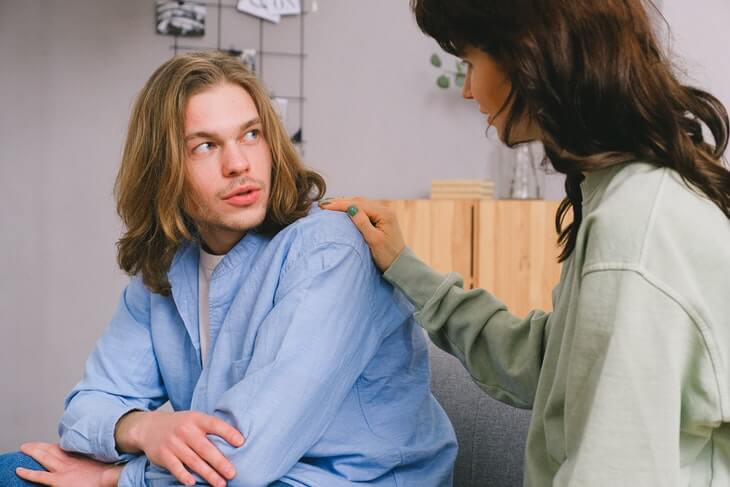 Woman Talking with Male in Lighting Room