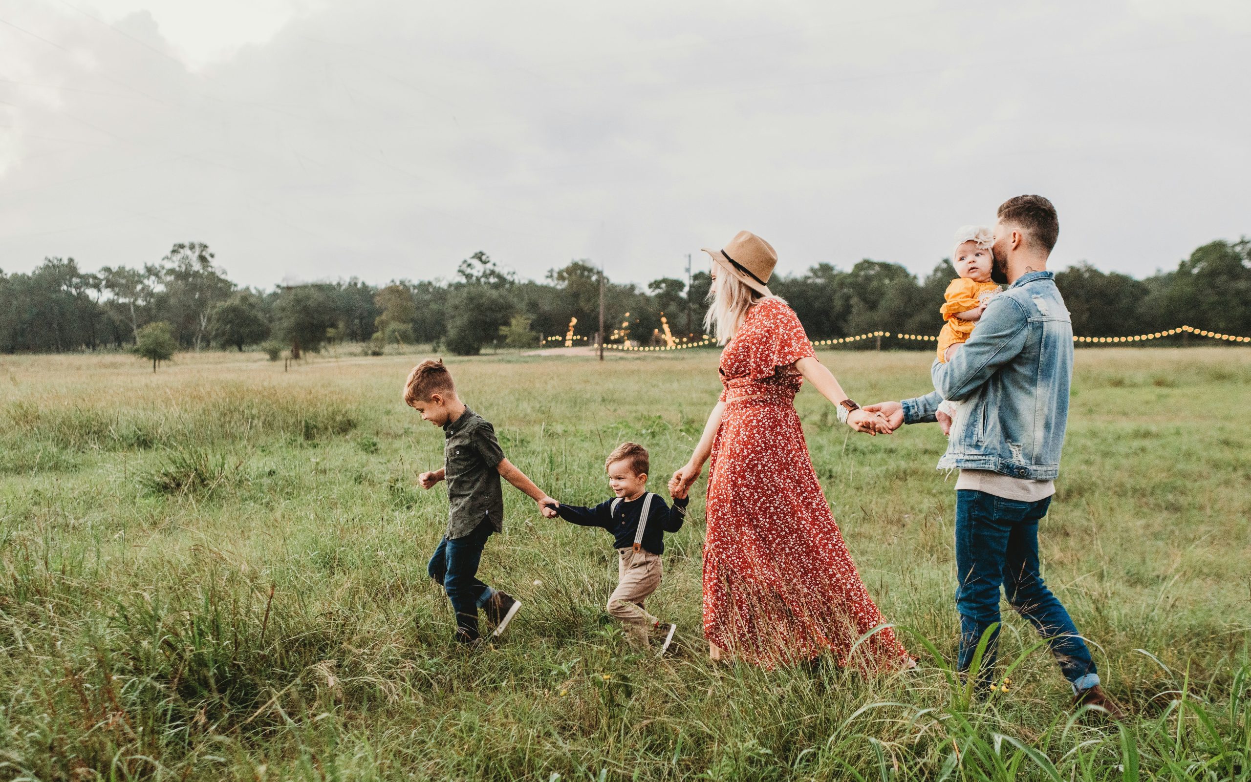 "Joining hands with a new partner, accompanied by children and loved ones, embarking on a new journey in life."